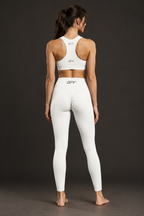 Ankle-length leggings back view with logo on sports bra 3