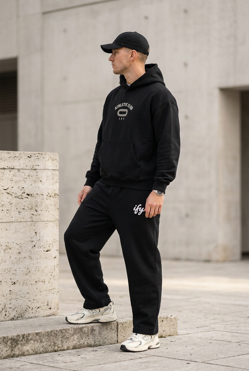 Black Athletic Club outfit, male side view