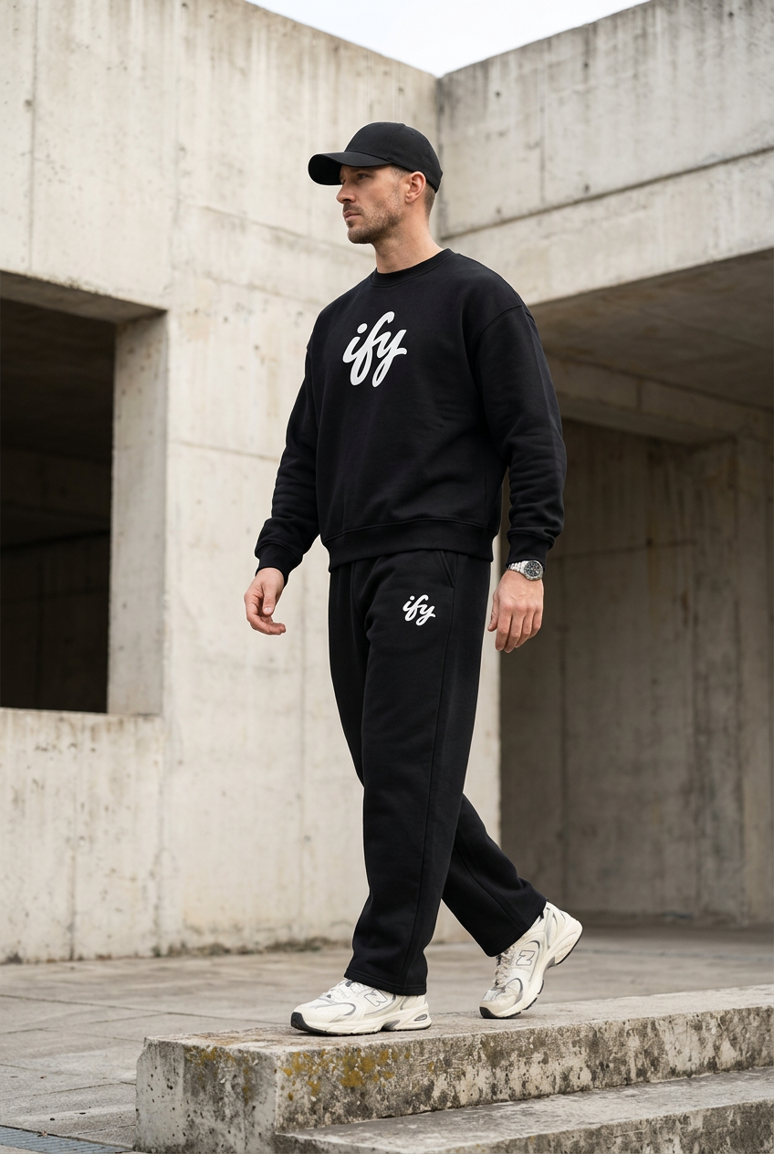 Black outfit, male side view
