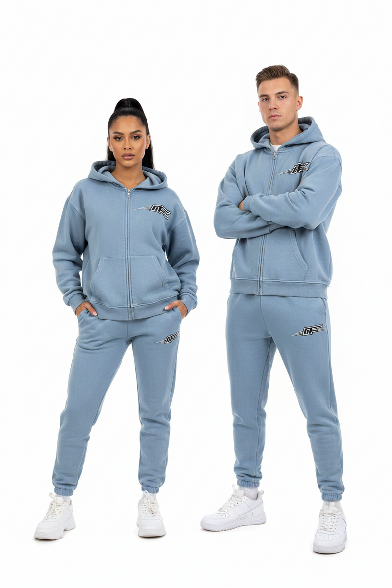 A light blue cropped zip-up hoodie with a front kangaroo pocket and a stylized 'MFF' logo printed on the left chest, displayed on a solid white background.