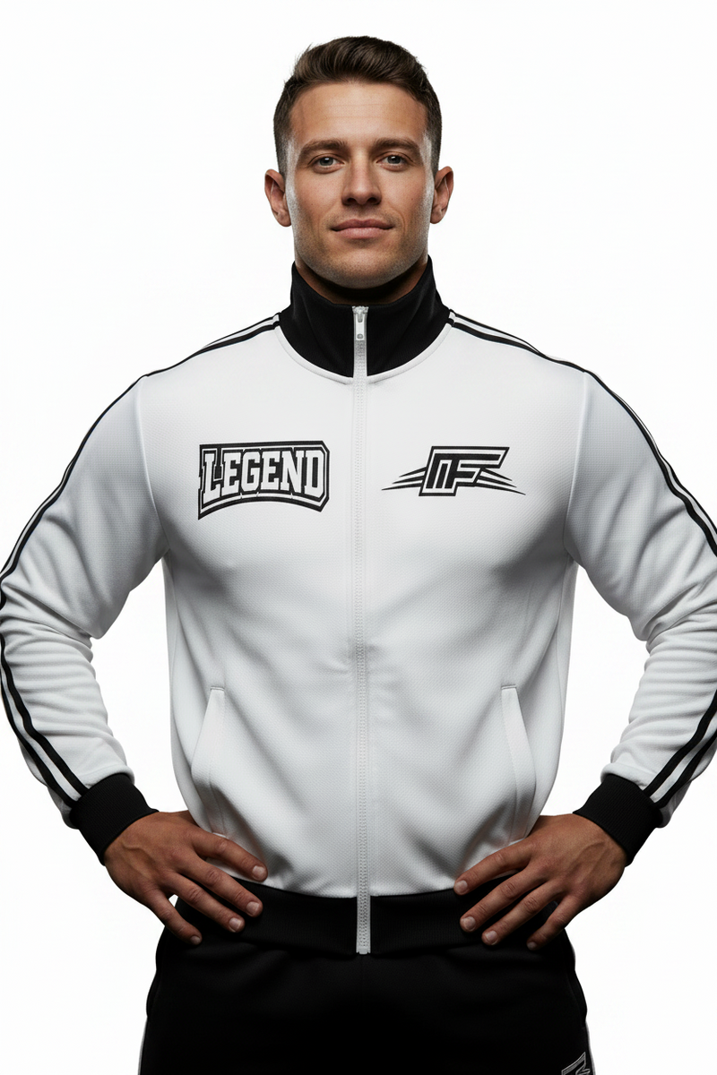 A white zip-up track jacket with black ribbed collar, cuffs, and hem, featuring black shoulder stripes and a black 'LEGEND' patch on the left chest alongside a stylized 'MF' logo on the right chest.