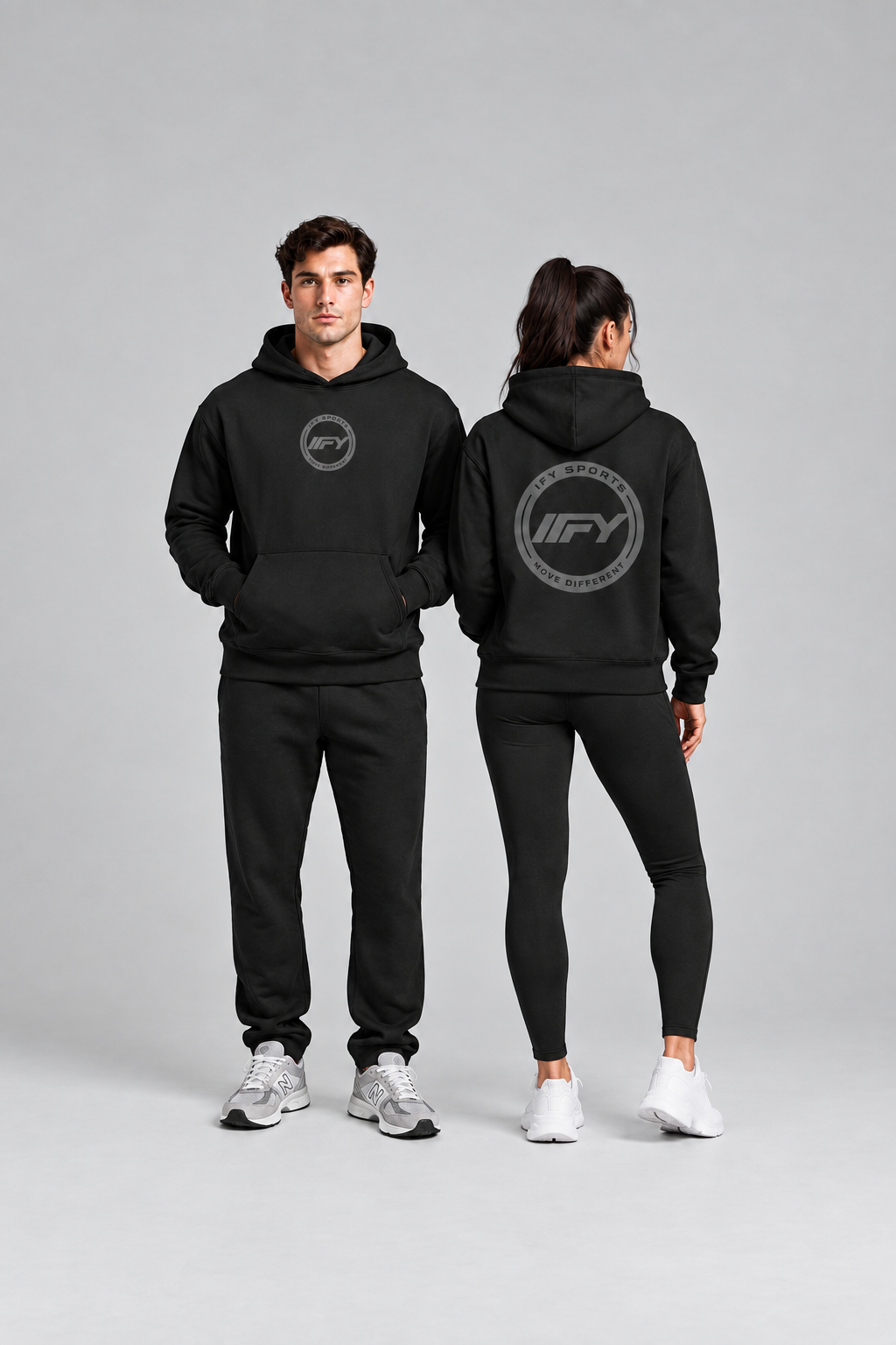 Full-height portrait of two models wearing black IFY hoodies