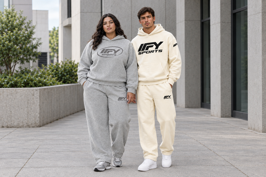 IFY hero image with a plus-size female model in grey and a male model in cream, centred together