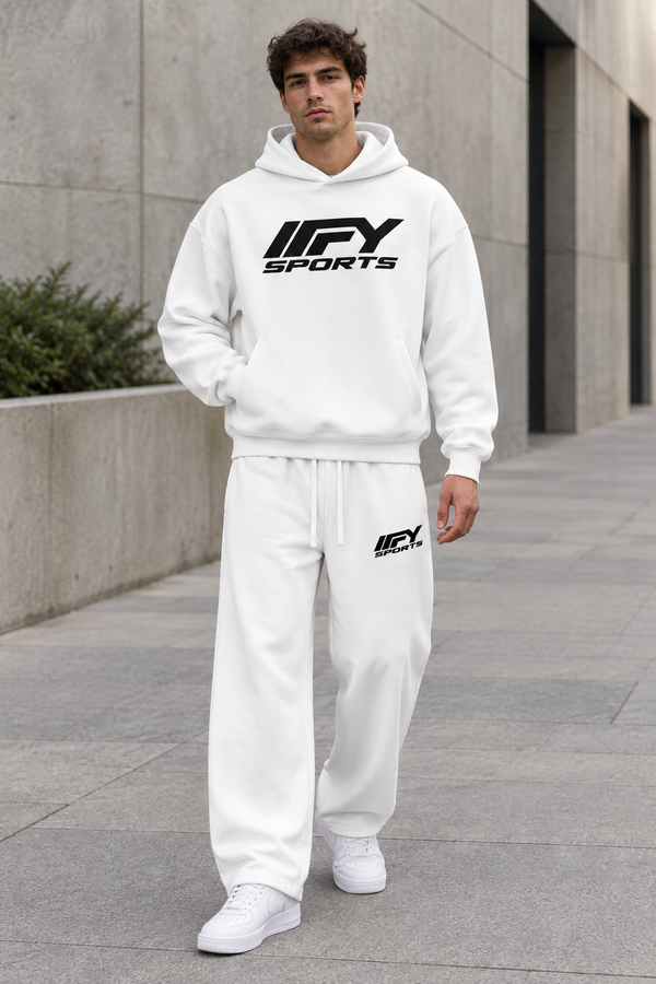 Male model wearing the white outfit with black IFY SPORTS logos and Nike trainers
