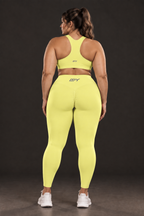 Plus-size model, back view with logo on sports bra (from back view 1)